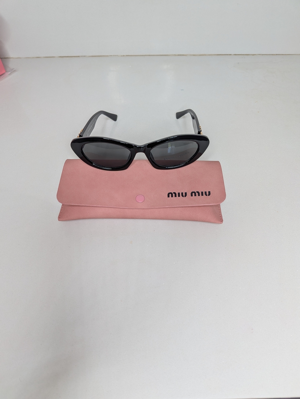 Miu Miu Women's Black Oval Cat Eye Sunglasses - Picture 7 of 13
